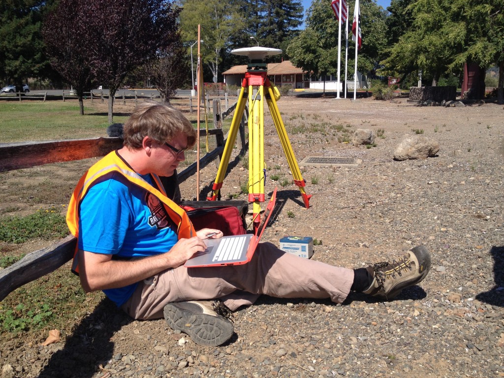 UC Riverside geophysicist Gareth Funning uses high-precision GPS antennae and benchmarks placed by the National Geodetic Survey to track ground movements in the Napa Valley. This marker is near Highway 29 in Yountville.