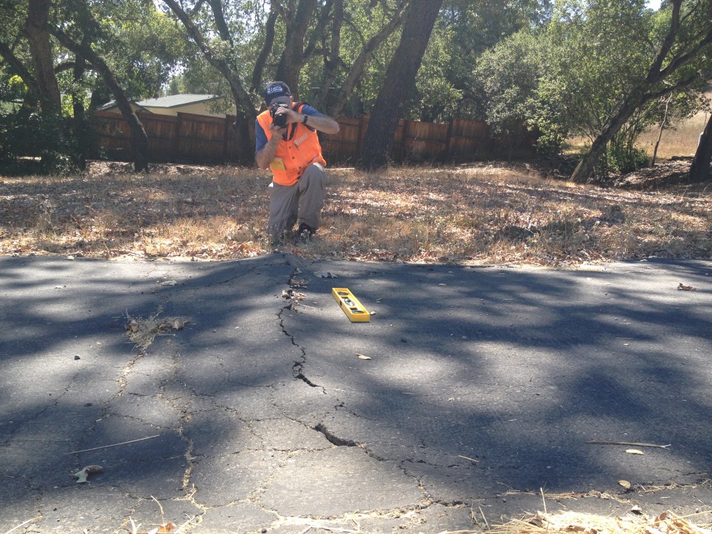 USGS Geologist David Schwartz identifies surface cracks in the west Napa Valley that show lateral slip, a clue to the location of faults that caused the magnitude-6 South Napa Earthquake on August 24, 2014.
