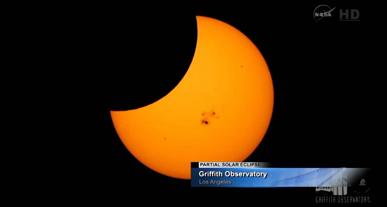 Screenshot from NASA's livestream of the eclipse. Large sun spots are visible. (NASA)