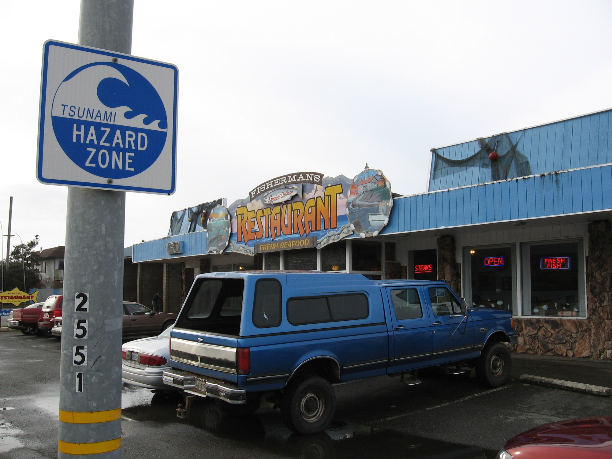 A tsunami warning sign in Crescent City, CA, which has a well-rehearsed response plan. (Craig Miller/KQED)