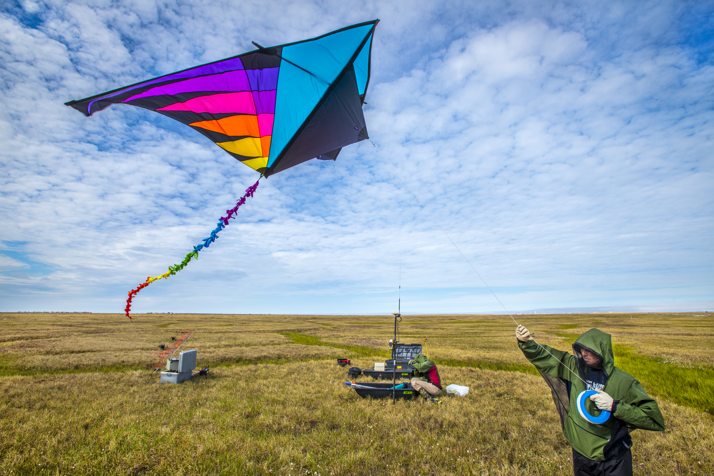 Craig Ulrich collecting imagery of the land surface using sensors mounted on a kite.