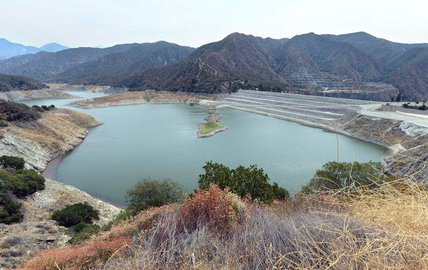 Receding water levels can be seen around the San Gabriel Reservoir, or San Gabriel Dam, on July 29. The reservoir provides flood control, groundwater recharge flows and hydroelectricity for the heavily populated San Gabriel Valley in the Greater Los Angeles metropolitan area. (Frederic J. Brown/AFP/Getty Images)