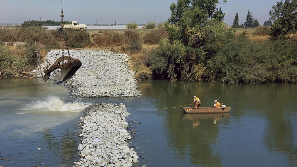 In the summer of 1976, the Department of Water Resources installed an emergency rock barrier in Sutter Slough. (California Department of Water Resources) 