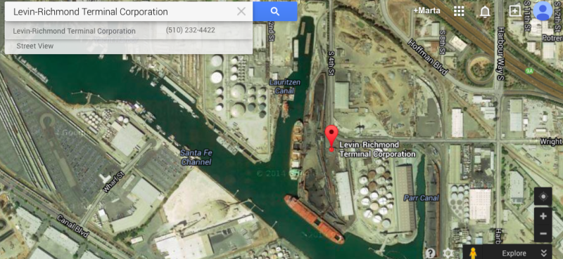 Aerial view of Levin-Richmond Terminal, via Google. The dark ovals are piles of petcoke or coal waiting for export. 