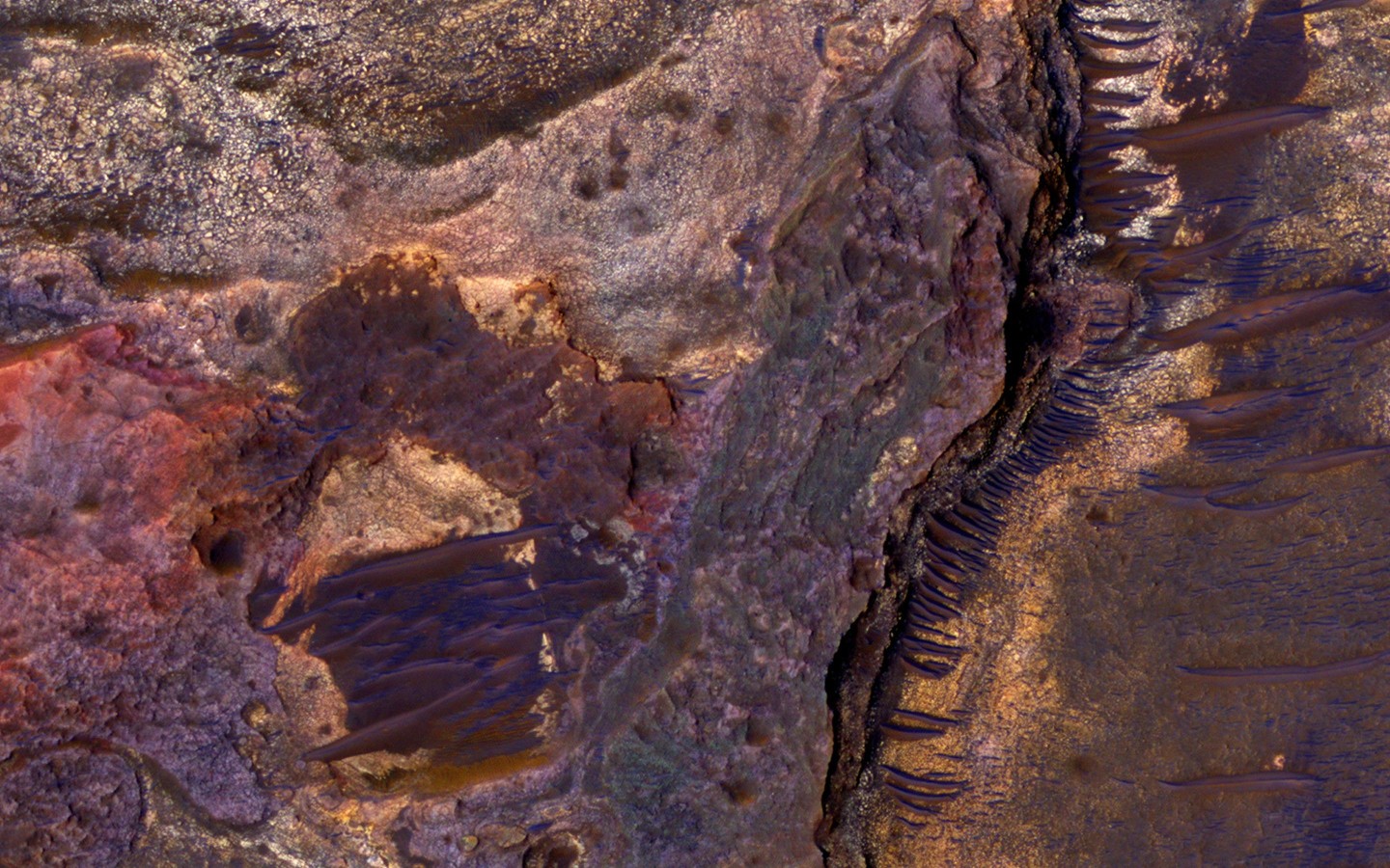 This image shows layered sedimentary rocks on the floor of an impact crater north of Eberswalde Crater. There may have been a lake in this crater billions of years ago. (NASA/JPL-Caltech/Univ. of Arizona)