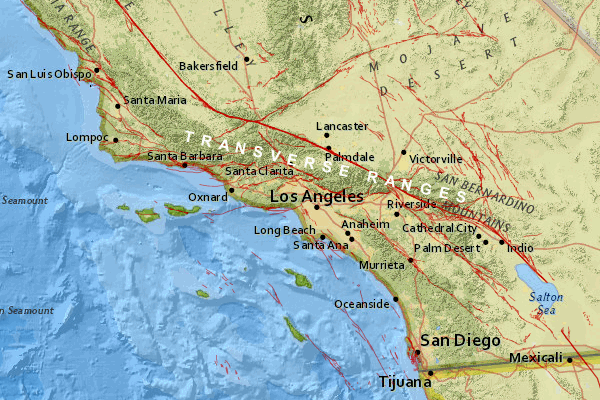 The Transverse Ranges are raised by transpression across the San Andreas fault (heavy red line). Offshore faults in the Borderland have the same tangled relationships as the faults seen onshore.