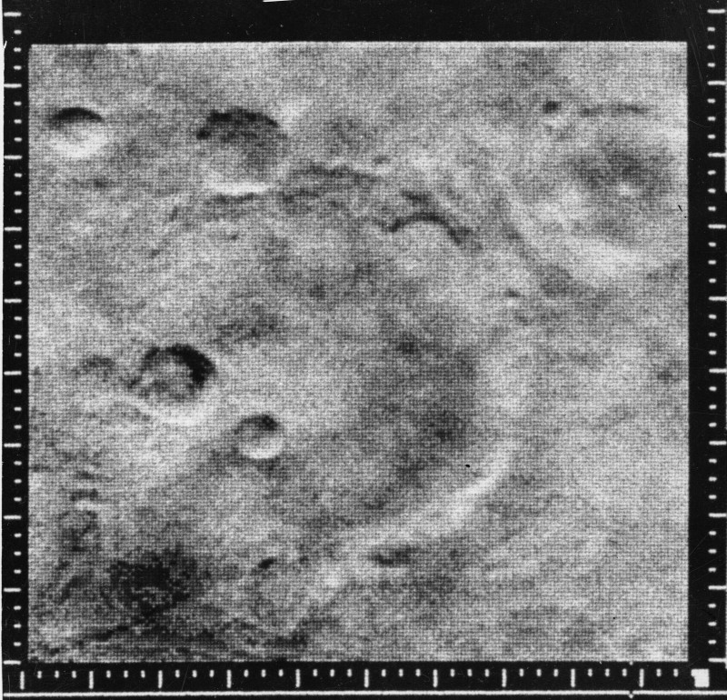 Mariner crater, snapped by the Mariner 4 spacecraft on July 15, 1965, from a distance of  7,800 miles. (NASA