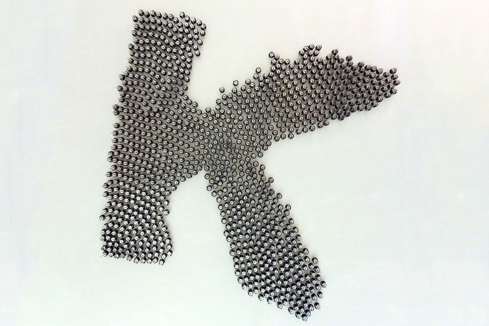 In half a day, the swarm of 1,000 kilobots can self-assemble into a variety of shapes.