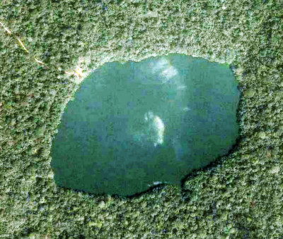 Meteorite impact crater Lake Ejagham in Cameroon. (Google Earth)