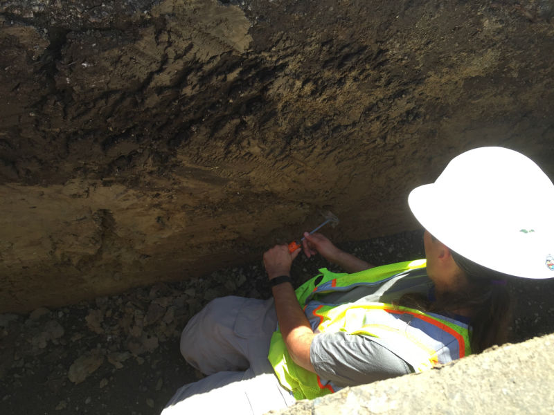 Tim Dawson, an engineering geologist with the California Geological Survey, hops into a trench to look for hints of the fault that shook Napa last year.