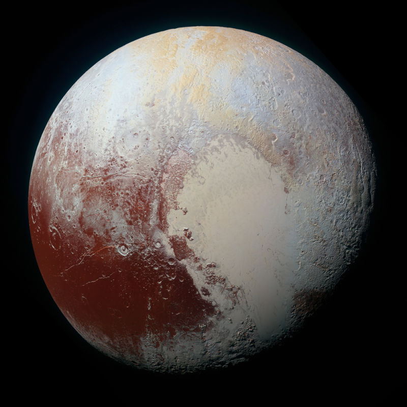 New Horizons' high-resolution color-enhanced portrait of Pluto exaggerated colors showing variations in surface composition and terrain.