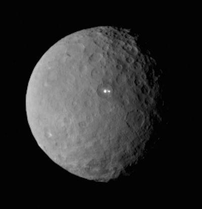 Early images of Ceres' mysterious white spots showed them as little more than bright, featureless dots. 