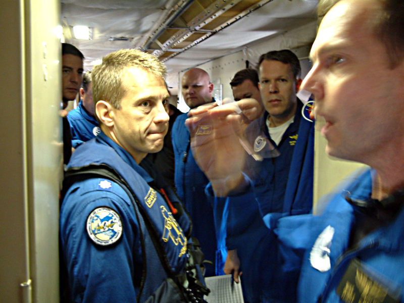 The Hurricane Hunter crew debriefs after a research flight.