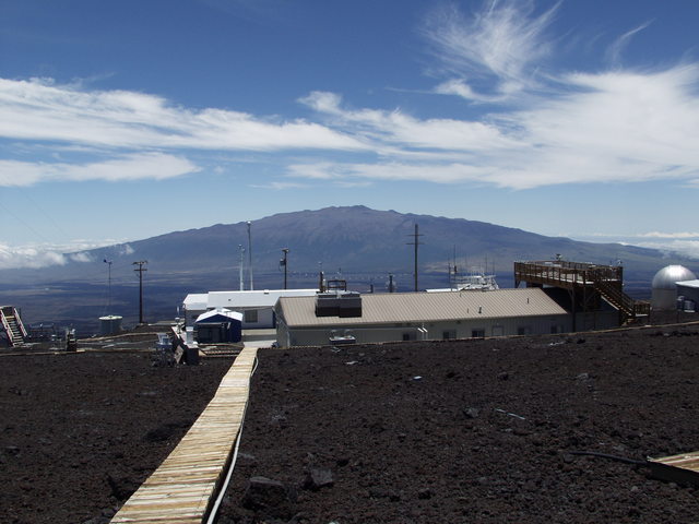 NOAA's Mauna Loa Observatory on Hawaii, a small collection of buildings where scientists take key measurements on air and sunlight.