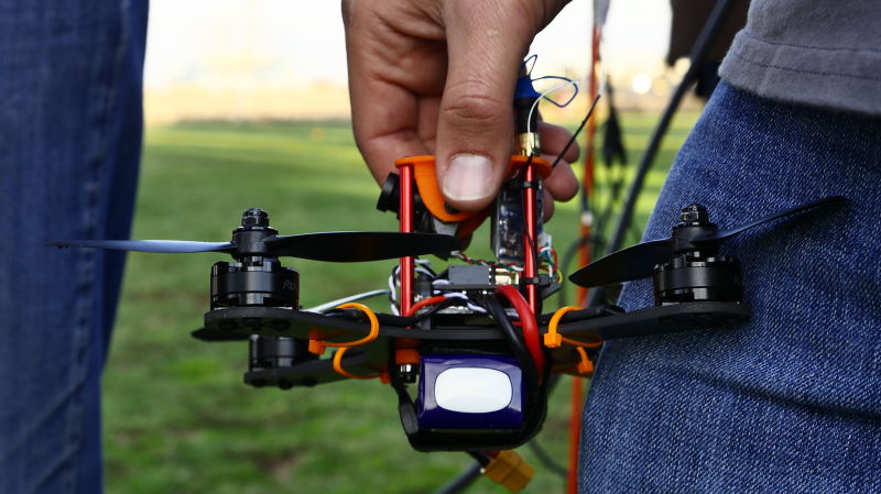 The drones used for racing are small, typically under a pound, and built using parts such as motors, a small camera and a flight controller. 