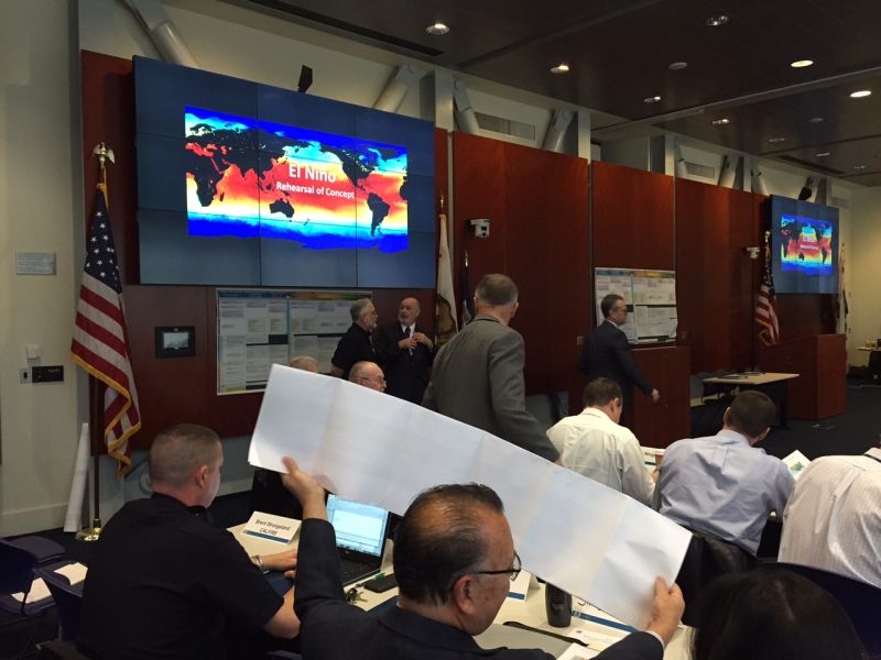 Government officials gather at the California Office of Emergency Response during an El Nino disaster response planning session.