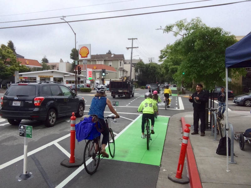 Flexible posts block traffic from driving into a new protected bike lane in Berkeley.