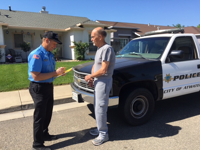 Greg Olzack, a former mayor and city council member of Atwater, became a volunteer "water cop," driving around the town to write citations for water wasters.