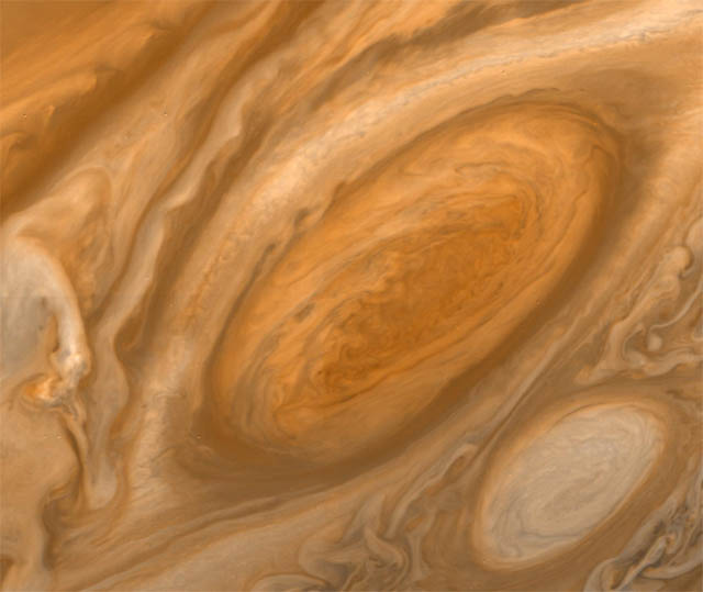 Jupiter's "Great Red Spot," an anticyclone system that is at least 300 years old and large enough to fit three planet Earths.