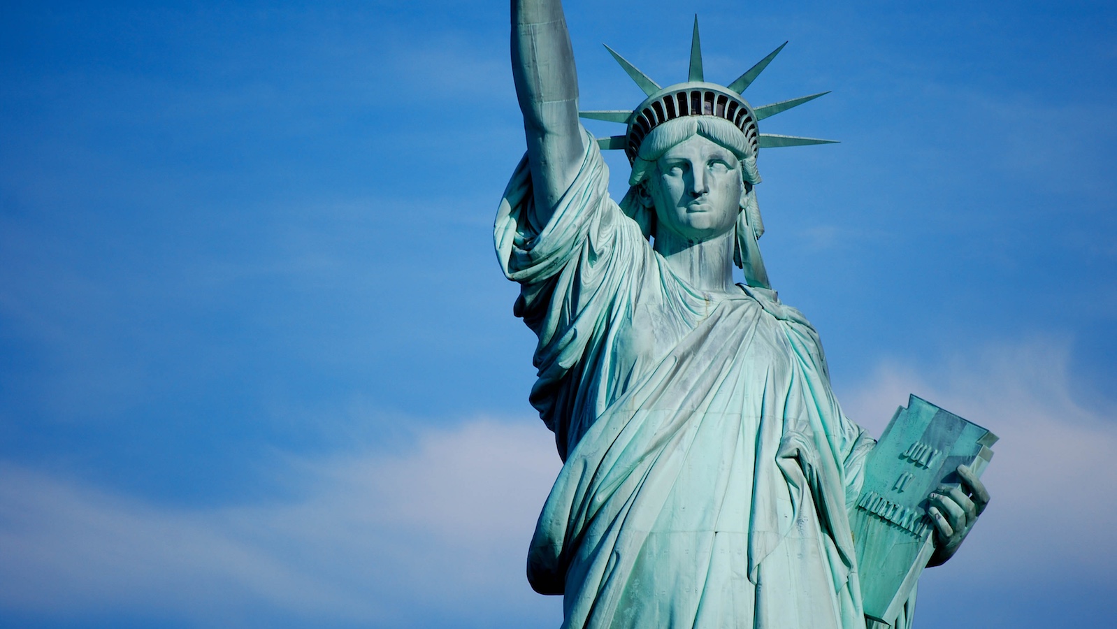 The Statue of Liberty and Ellis Island have stood as testaments to the promise of a better tomorrow. 
