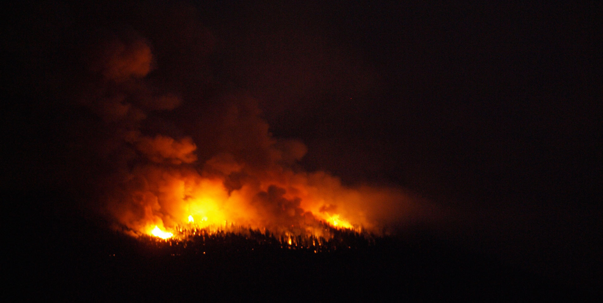 Firefighters lit a "back-burn" to control the Reading Fire in 2012.
