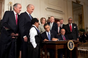 President Obama signs the Patient Protection and Affordable Care Act into law. March, 2010.