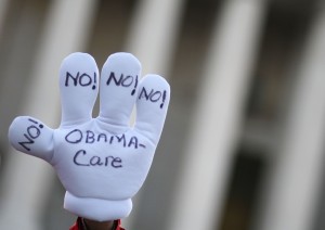Protestor at Supreme Court in March during oral arguments on the Affordable Care Act. (Getty Images: Mark Wilson)