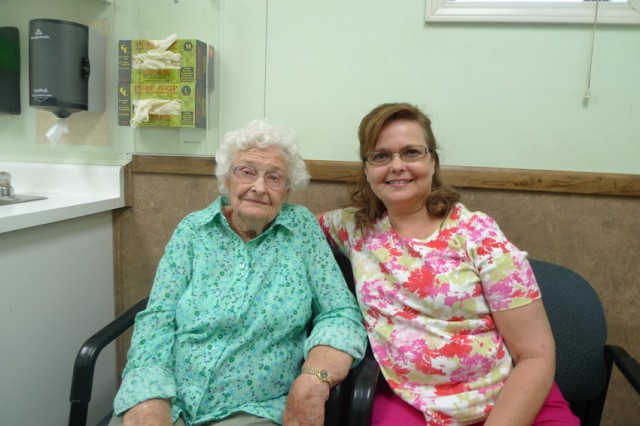 Maureen Williams (L) seen here with her daughter Carol Baskin, is 95 years old. Williams recently moved away from Firebaugh, but she returns to see Dr. Oscar Sablan. "He saved my life several times," she says. (Photo: Lisa Morehouse)