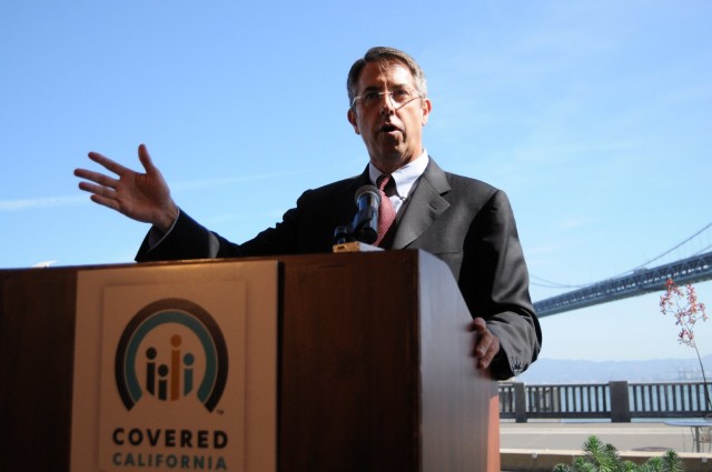 Covered California executive director Peter Lee speaking to advocates and reporters in San Francisco on Oct. 1. (Angela Hart/KQED)