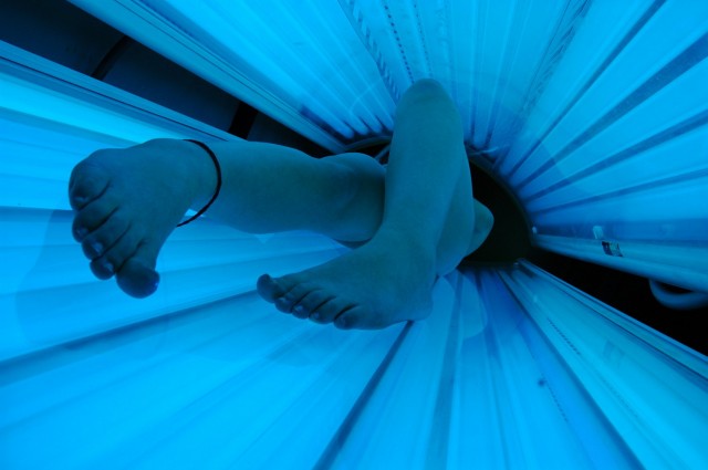Exposure to ultraviolet tanning devices before age 30 increases the risk of skin cancer by 75 percent. (Evil Erin/Flickr)