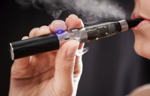 Woman using an e-cigarette. (Getty Images)