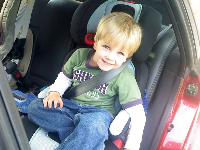 Children should always use a booster seat until they are big enough to fit in a seat belt properly. (Joshua & Amber/Flickr)