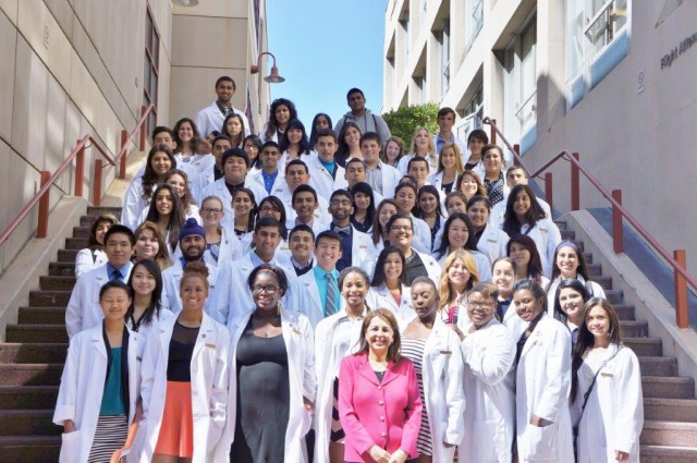 Graduating seniors from the three Doctors Academy sites in Fresno. Dr. Katherine Flores, founder of the academy, stands in the front row. (Courtesy: Doctors Academy)