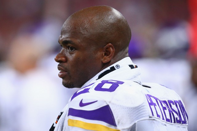 Adrian Peterson has been suspended from all Minnesota Vikings activities since he was indicted on child abuse charges. (Dilip Vishwanat/Getty Images)