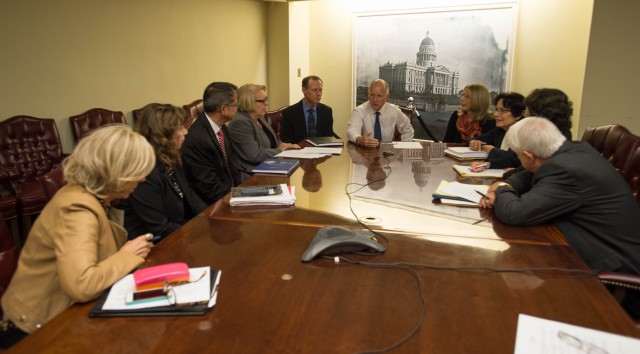 Gov. Jerry Brown meets with state officials, including Dr. Ron Chapman, state health officer, on 
