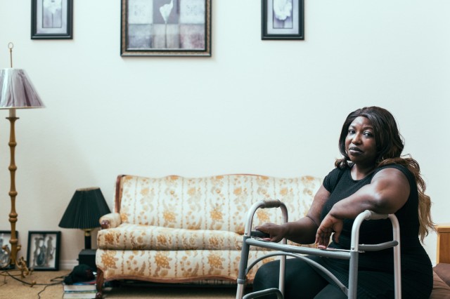 Derika Moses, a former softball star, lost her job, and then her home, as she grappled with pain and illness after her spinal surgery. (Annie Tritt/CIR)