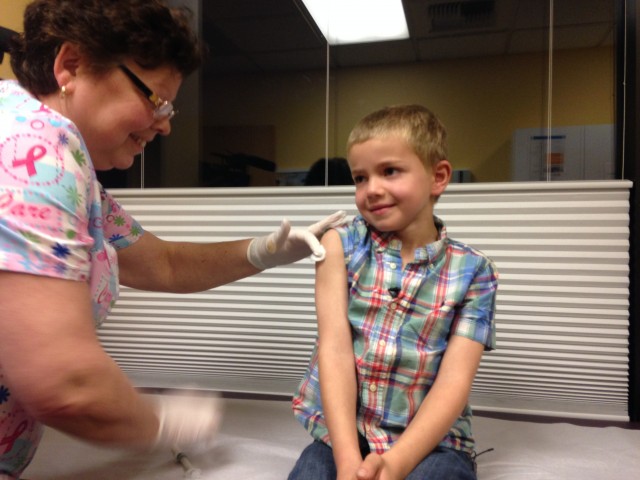 Rhett Krawitt, of Corte Madera, received the measles, mumps, rubella vaccine on Friday. (Lisa Aliferis/KQED)