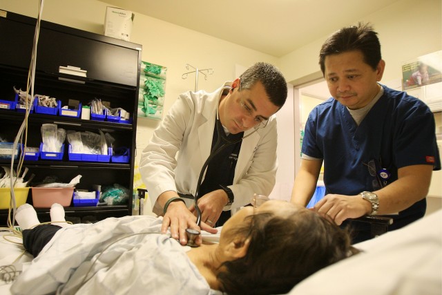 FILE PHOTO: Doctors in an emergency room in Panorama City, Calif. (David McNew/Getty Images)