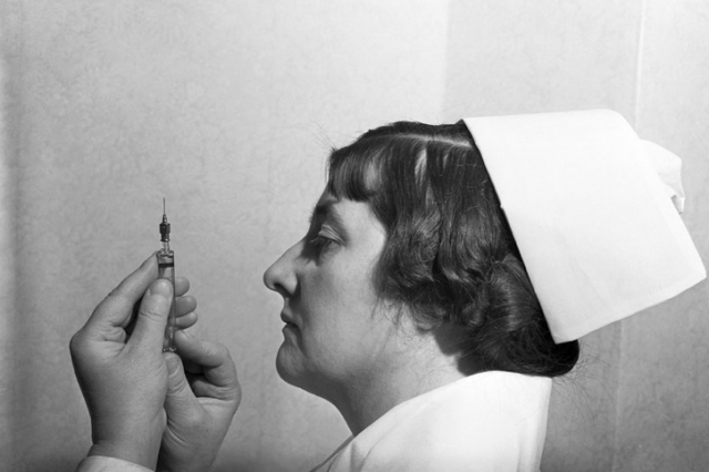 A nurse in 1938 checks the amount of insulin in a needle. For many decades, the only insulin available to people with diabetes came from the pancreases of cattle or pigs. Insulin from animals is still available outside the U.S. — and cheaper than a recombinant DNA version. (Bettmann/Corbis)
