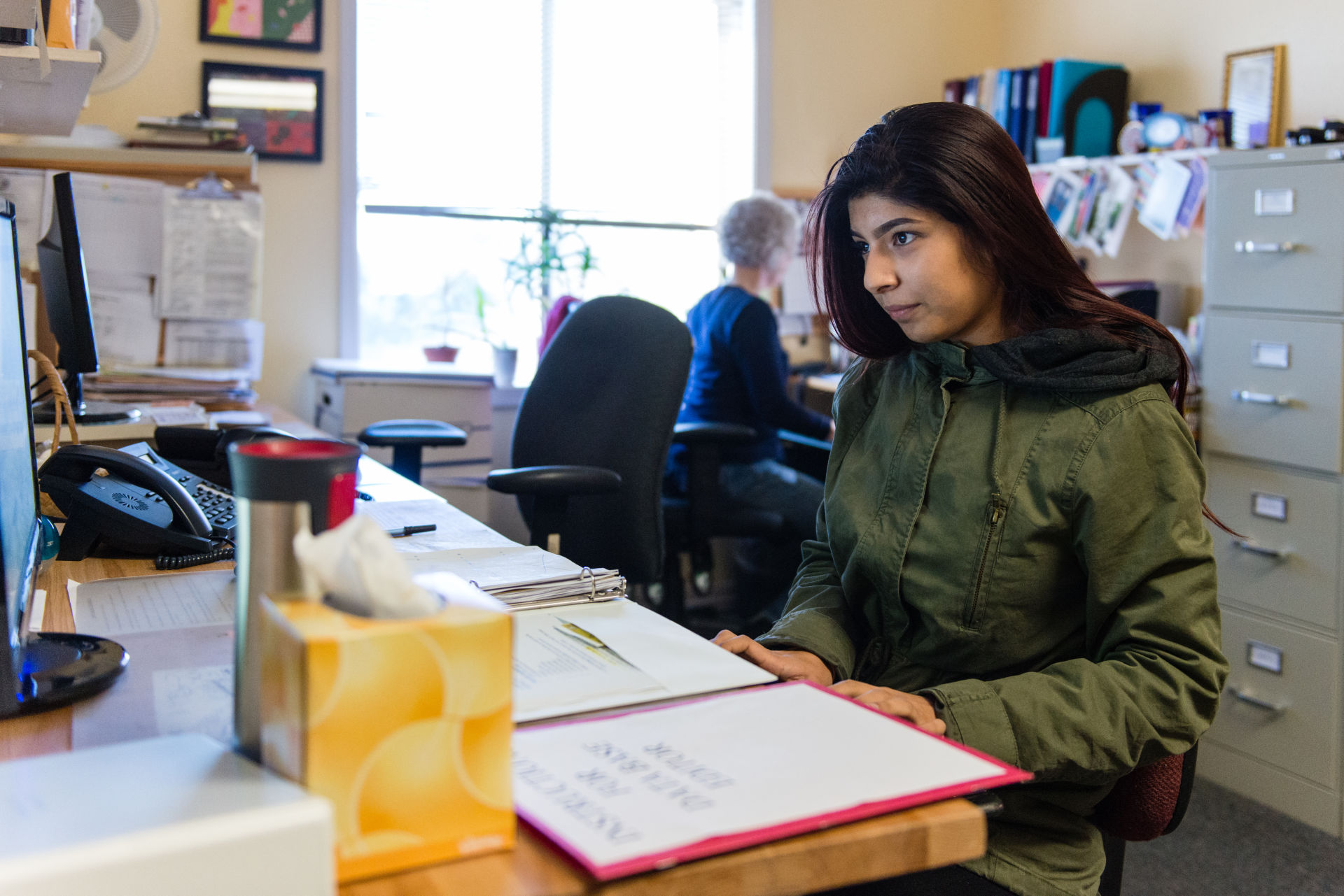 Nubia Flores Miranda, 18, works part-time at Family Paths, a counseling and mental health organization in Oakland. Miranda said she became interested in a career in mental health after she started experiencing depression and anxiety her freshman year at Life Academy of Health and Bioscience. 