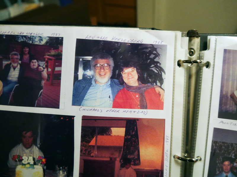 One of Michael's albums, with a photo of his birth parents, Lee and Len Herzenberg. 