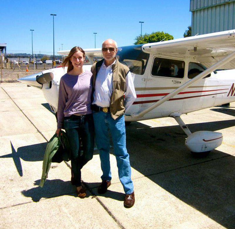 Ray Perman’s first career was as a pilot, similar to his father. He poses here with his daughter, Andrea, before a recreational flight. Andrea is now 24. His son, Eric, is 27.