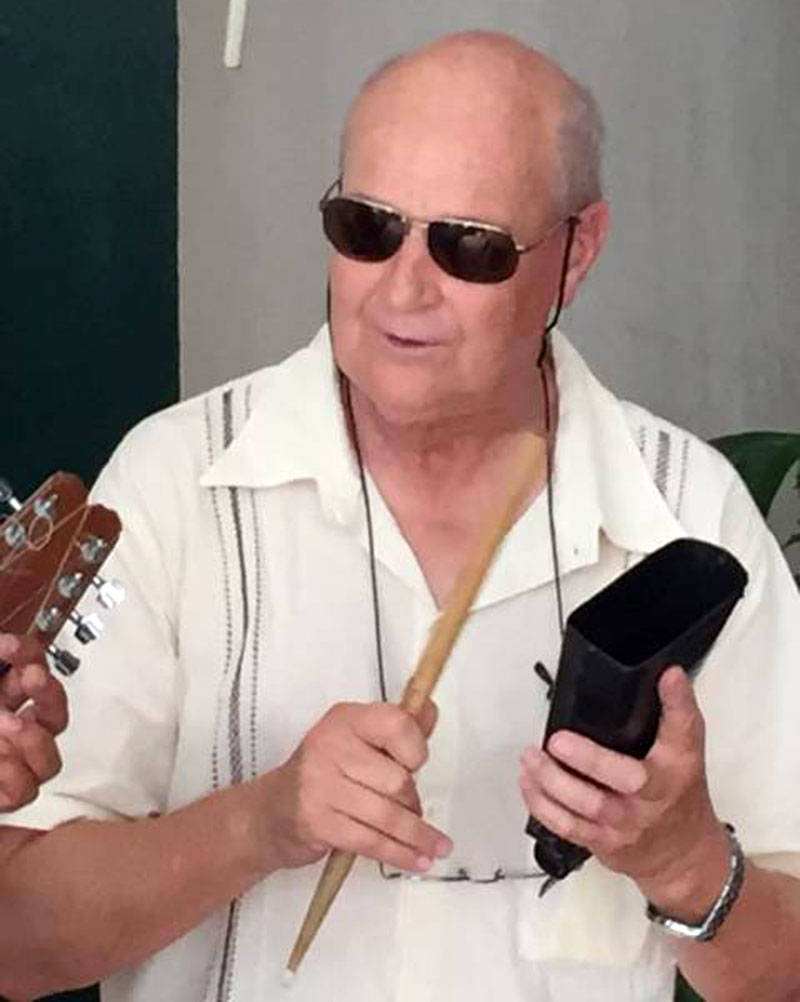 Ray Perman is a percussionist, avid traveler and self-described “manic volunteer.” Here he plays the Cuban bell during a trip to Havana last March, where he played with six bands.