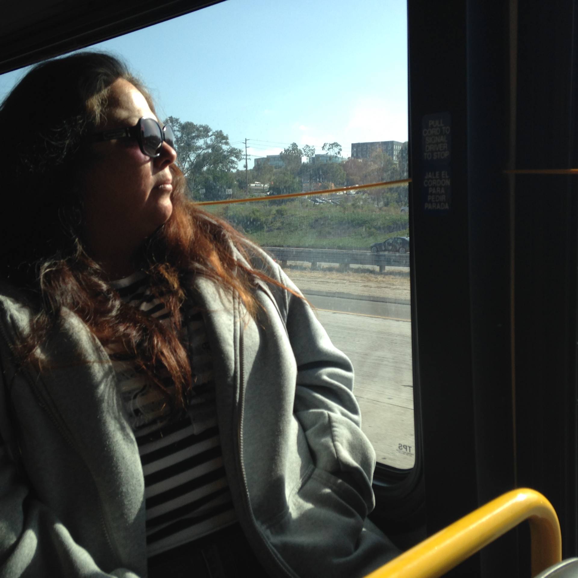 Maria Spivey, riding a bus in San Diego. She's on leave from her job as a driver. 