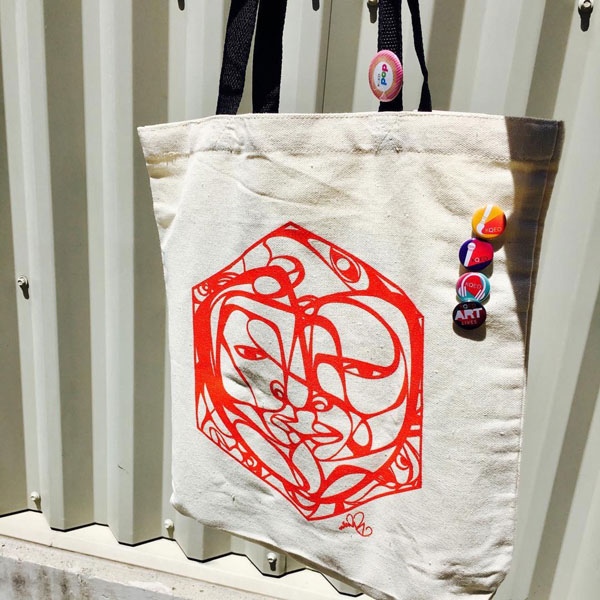 A custom KQED Arts tote bag by Favianna Rodriguez