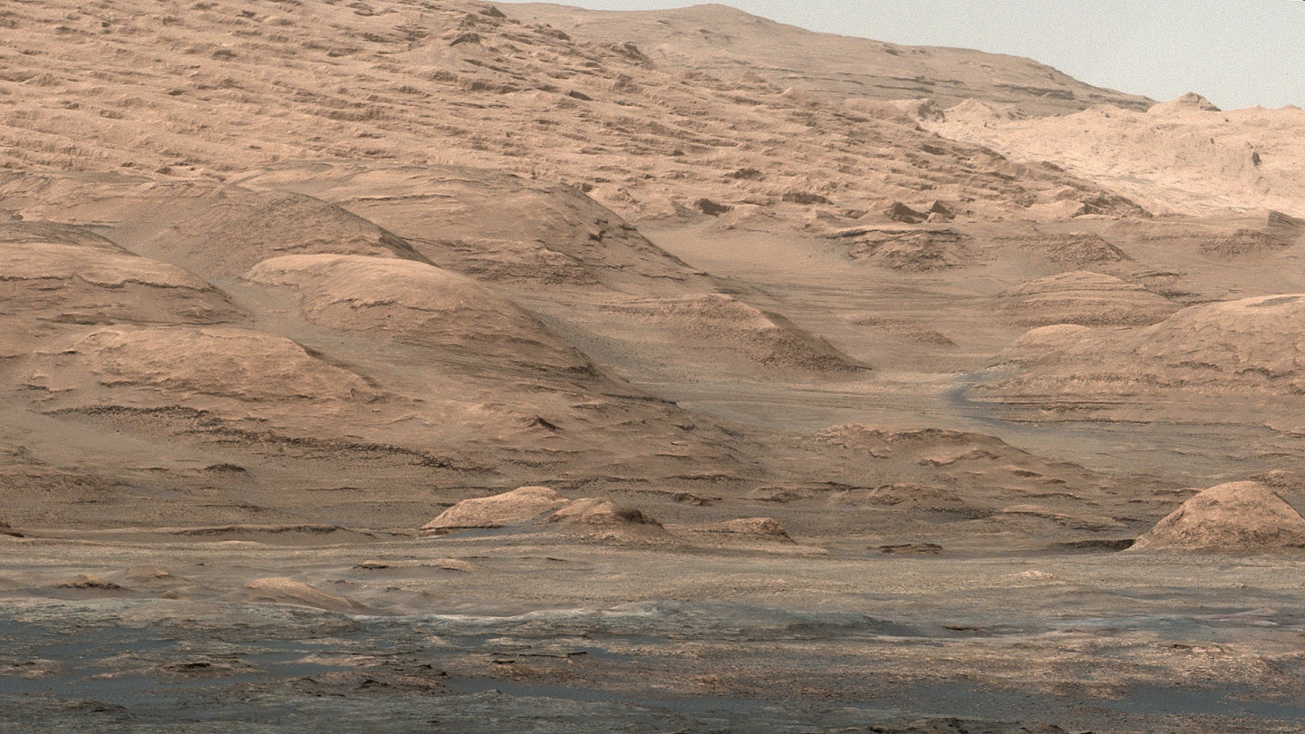 An image from NASA's Curiosity Mars rover shows dramatic buttes and layers on the lower flank of Mount Sharp on Mars. (NASA/JPL-Caltech/MSSS)