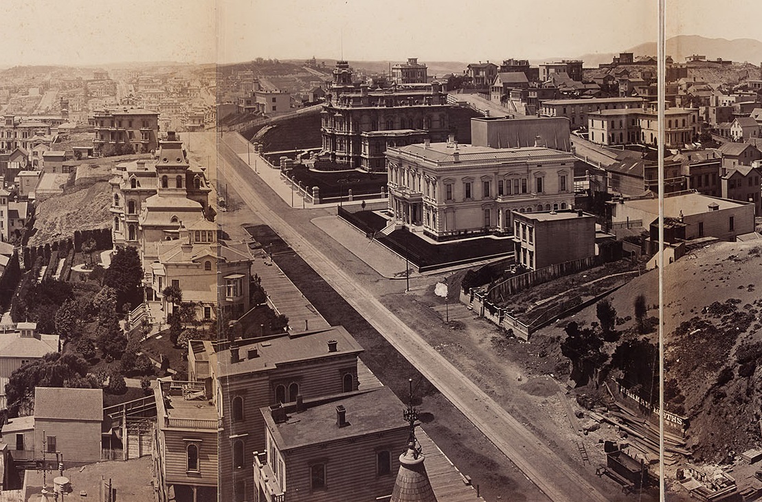 A panorama of San Francisco taken in 1878 from the Mark Hopkins mansion on Nob Hill by photographer Eadward Muybridge.  The large, dark-colored edifice at center was the home of railroad magnate Charles Crocker. The spite fence he built to retaliate against neighbor Nicholas Yung is the large rectangular structure to the right of the mansion in this image. This copy of the panorama is in the collection of the Society of California Pioneers and was restored in 2011 by Gawain Weaver Art Conservation. Eadward Muybridge/Gawain Weaver Art Conservation