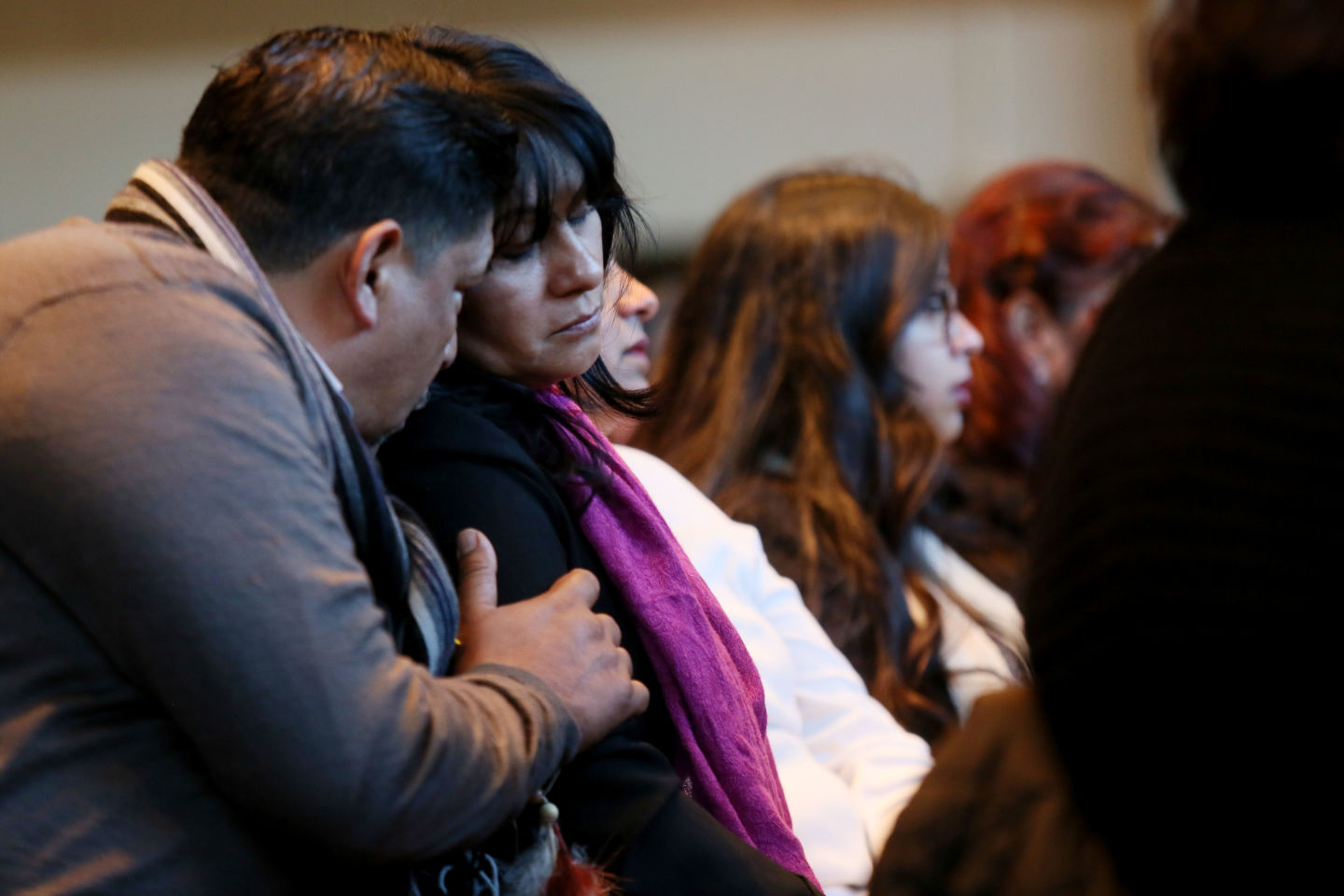 Stepfather Jose Hernandez and mother Beatriz Hernandez weep during a Nov. 15 vigil in Long Beach for Nohemi Gonzalez, 23, who was killed during attacks in Paris two days earlier. Gonzalez, from El Monte, California, was a senior at CSULB studying design and attending Strate School of Design during a semester abroad program.   
 (Sandy Huffaker/Getty Images)