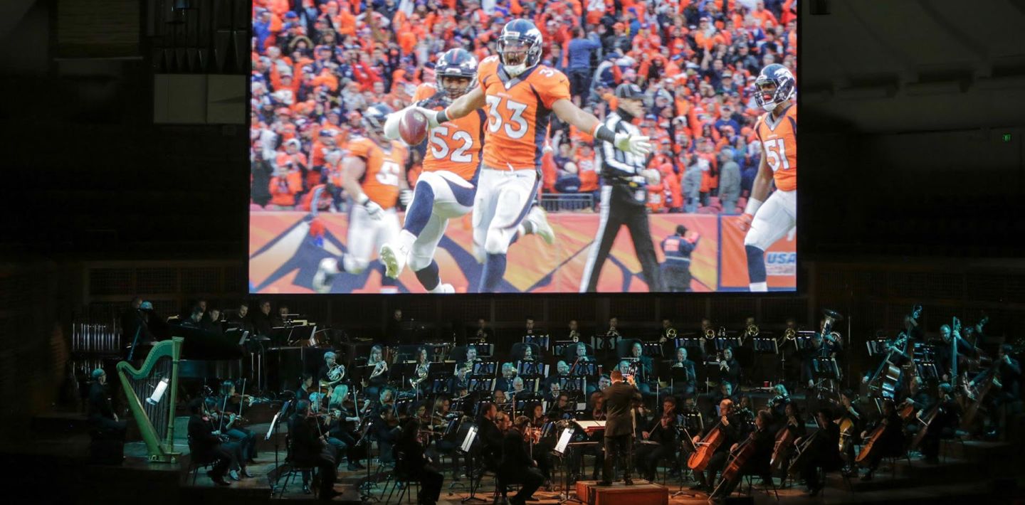 For "Super Bowl 50: Concert of Champions," the San Francisco Symphony played a night of football music, set to clips from football films. Photo: Amelia Kusar