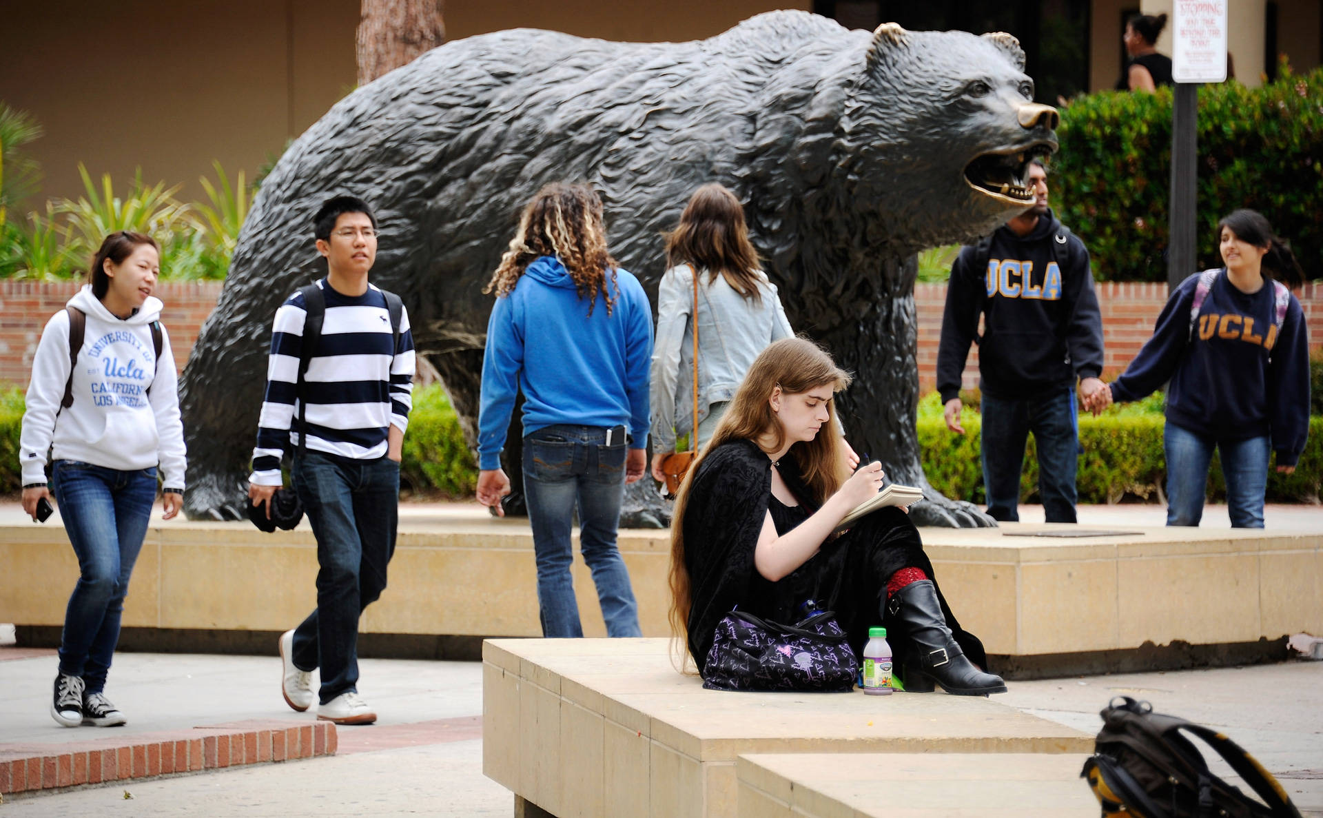 Students walk near the Bruin Bear statue on the UCLA campus. Kevork Djansezian/Getty Images